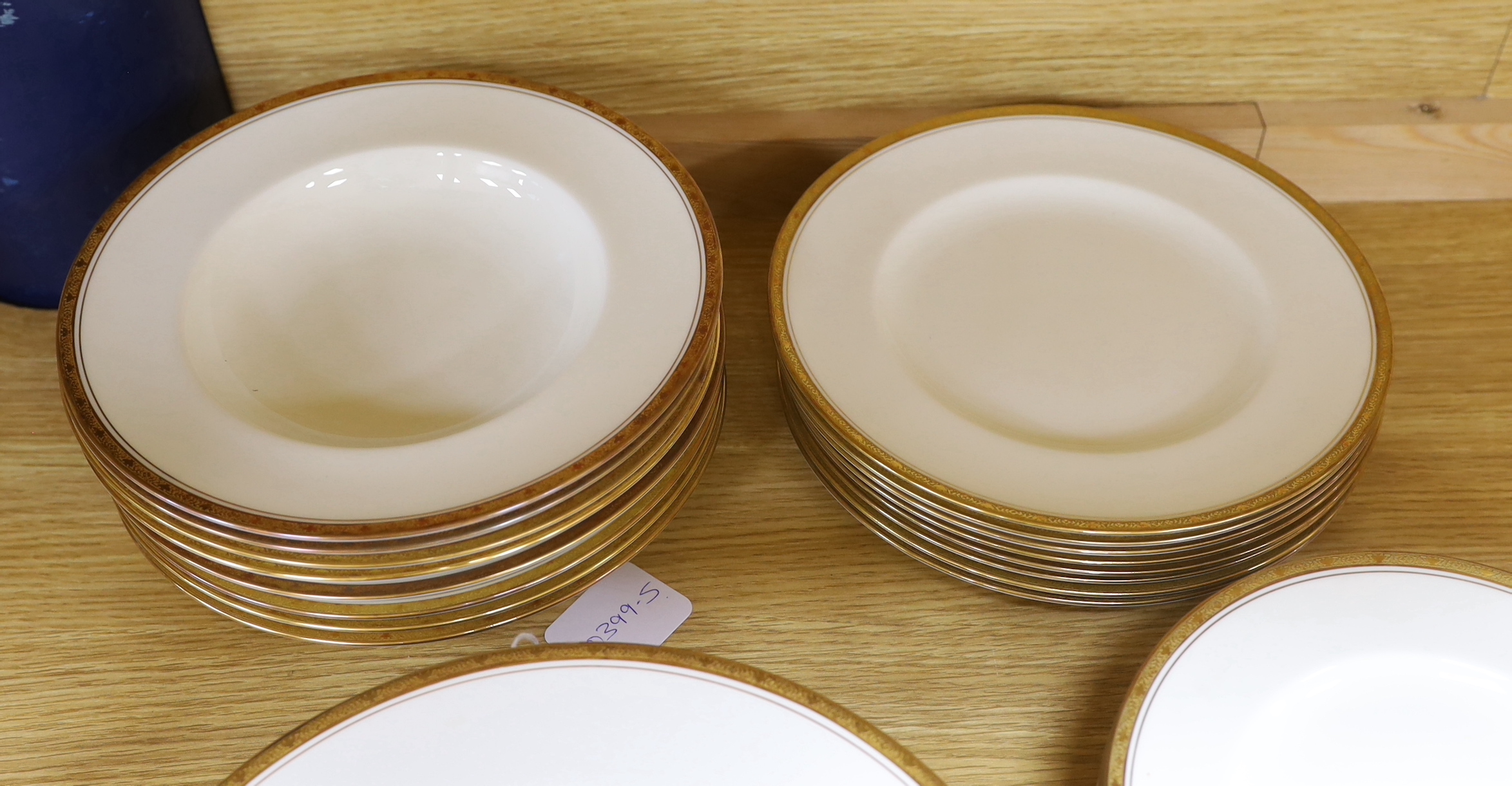 Royal Worcester Chancellor porcelain dinner service including side plates, soup bowls and sauce boat, the largest each 27.5cm in diameter